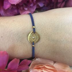 Bracelet élastique bleu Oeil or