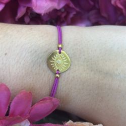Bracelet élastique fuchsia Oeil or