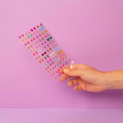 Coffret de 104 boucles d'oreilles autocollantes